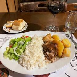 2nd course: roasted chicken. So delicious. All this for €9.