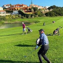 Miriam practising her forward rolls while waiting for Scott's shot