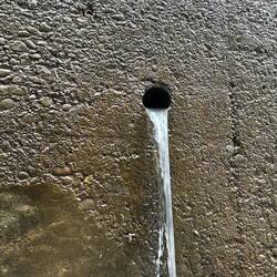 Small drain hole in lock wall.  Rosanne was a little worried as this was right next to her window.