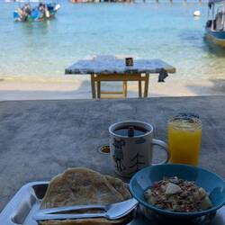 Beach breaky, roti chanai and museli and cute mug of tea