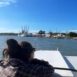 Tour is about to end at an old Harbor with wooden ships that were beautiful