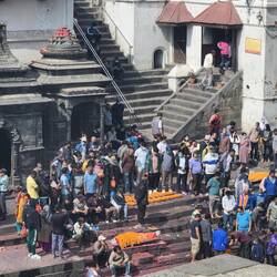 3 families were going through the final blessings and preparing their loved ones for cremation