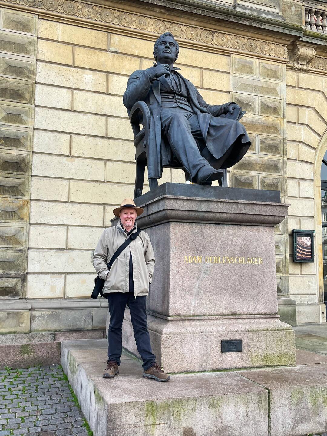 Ian with a statue of Adam Gottlob Oehlenschläger a Danish Poet & Playwrigt