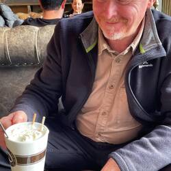 Ian about to enjoy a dark chocolate, hot chocolate with cream