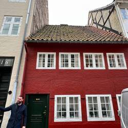 Unusual residence with the front door opening onto the street