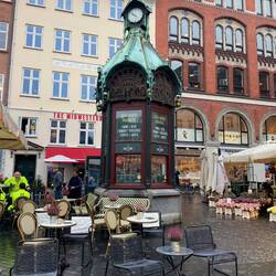 These copper roofed structures sold papers, now repurposed as bars and cafes with outside seating