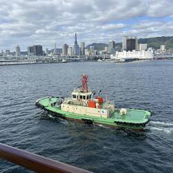 Pilot boat riding alongside as we enter the port of Kobe