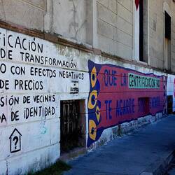 "Loss of identity" is probably the most serious of the features listed in this graffiti.