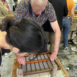 Lift frame to remove what will become 8 pieces of paper.