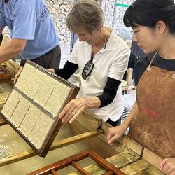 Lee removes the frame and tilts to drain.