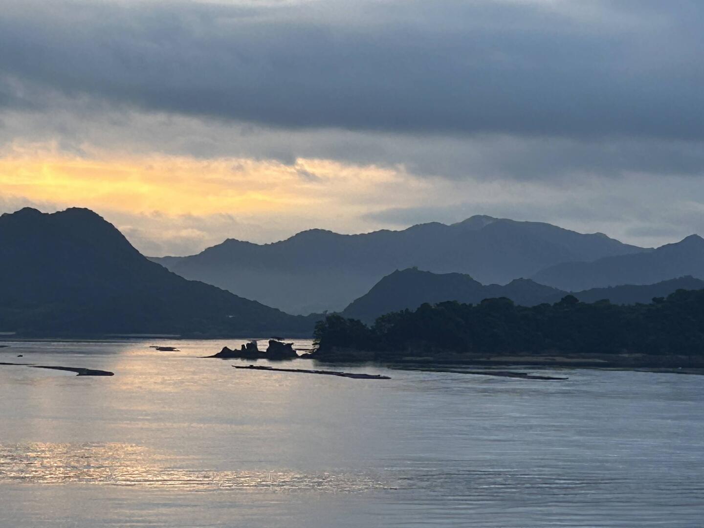 Approaching Hiroshima, with oyster beds in the foreground.