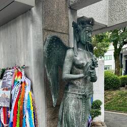 Goddess of Mercy statue as part of the memorial.