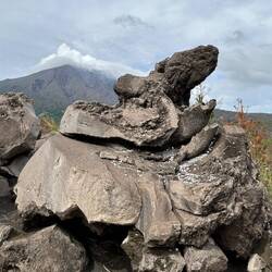 People leave coins on the rocks, and almost anywhere, as prayers.