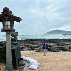 Large waves in the background.