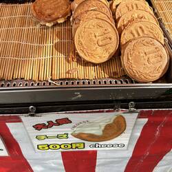 Popular cheese filled pancakes have design on them of ten Yen coin