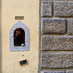 A wine window, evidently made famous by Stanley Tucci recently