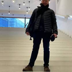 On the stairs heading down