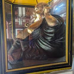 Laughing Budda in pagoda complex
