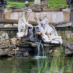 Roman Ruins Fountain ... the figures represent the gods of the Rivers Danube and Enns — Schönbrunn.