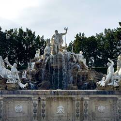 The sculptural grouping of the Neptune Fountain features the great god and his cronies ... Schönbrun