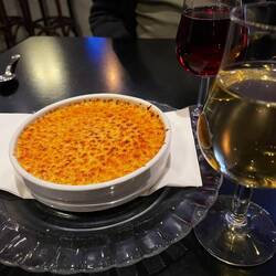 We shared a crème brûlée with a glass of sticky