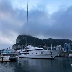 A small yacht with a personal helicopter ... some mega yachts in this harbour