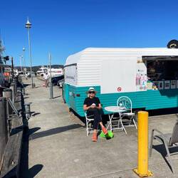 Coffee in the sunshine at Tribunna wharf awaiting the ferry to Maria Island