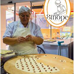 Filling and folding individual pieces of mantı is a time consuming process ... Sinope — Bostanlı.
