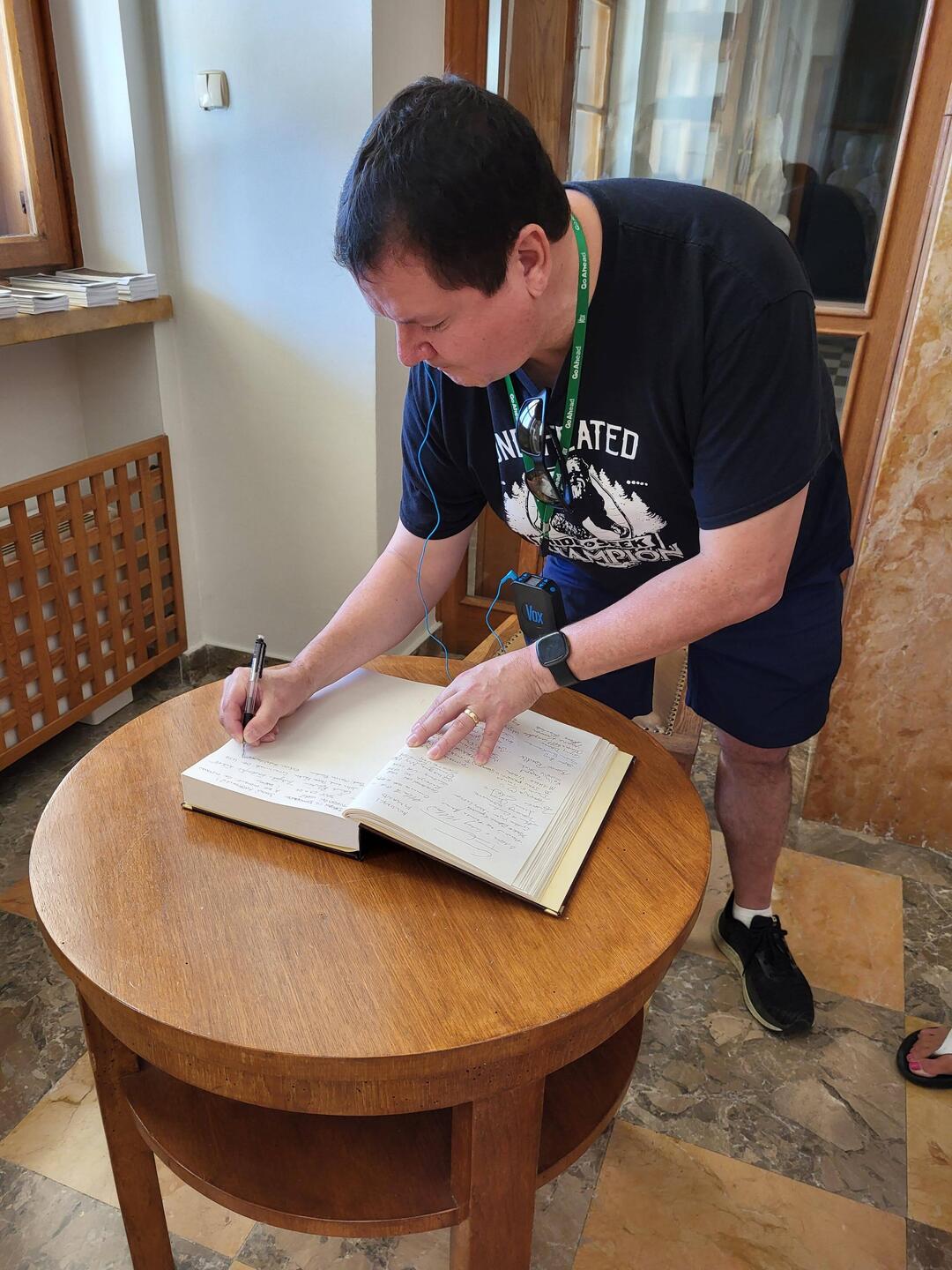 Signing the guest book