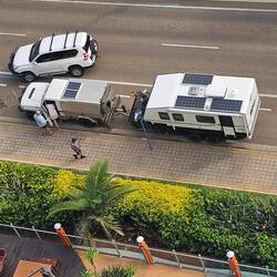 Campers are fully prepared for their trip; complete w/ sunpanels on both the camper & the truck!