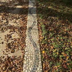 This stone pathway runs along the exterior path at the park