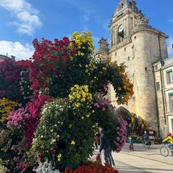Flowers lines this tower