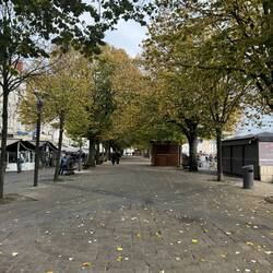 Walkway with full colors lined with cafes, restaurants and Brasserries