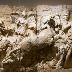 Parthian Monument: the Emperor climbing a quadriga, a chariot drawn by four horses — Ephesos Museum.