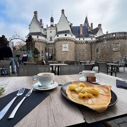 Cappuccinos, apple and butter crepe and the Château des Ducs de Bretagne