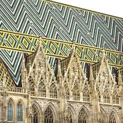 The iconic tile roof of St Stephen's Cathedral — Vienna, Austria.