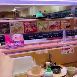 Things you order come to your table with an conveyer belt, even drinks and desert