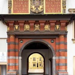 The red and black gateway to the Schweizerhof where the Imperial Treasury is located.