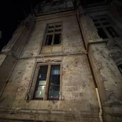 Pockmarked Palais of Justice, some filled with LEGO bricks