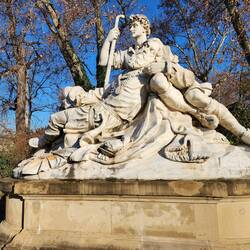 The Eberhardsgruppe, Palace Garden Stuttgart, shows Prince Eberhard I lying on the lap of a subject