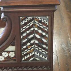 More inlaid mosaics on pew ends (a bit blurry)