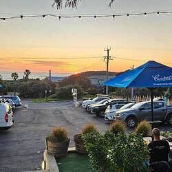 Ending up back at the breakfast cafe where now there's live music for sunset.