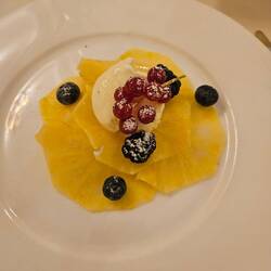 Pineapple carpaccio with lemon sorbet and berries!