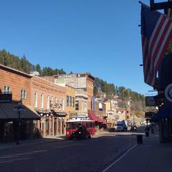 Main street with pubs, casinos and hotels, where once the brothels stood