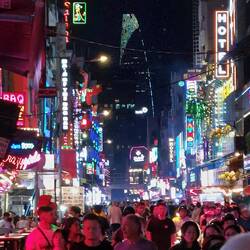 Bui Vien Walking Street; view with the Britexco Financial Tower in the distance