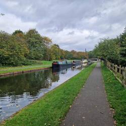 Over the other side of the canal looking towards the chimney of Cobbs Engine House