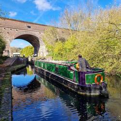 Passing under the disused viaduct between Parkhead locks 1 and 2