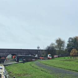 A tow truck removing the abandoned car