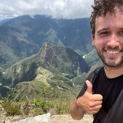 Auf der Spitze des Bergs Machu Picchu