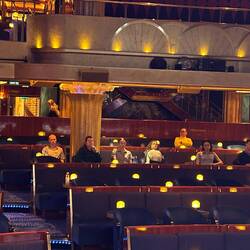 The performers watching us from the theater.